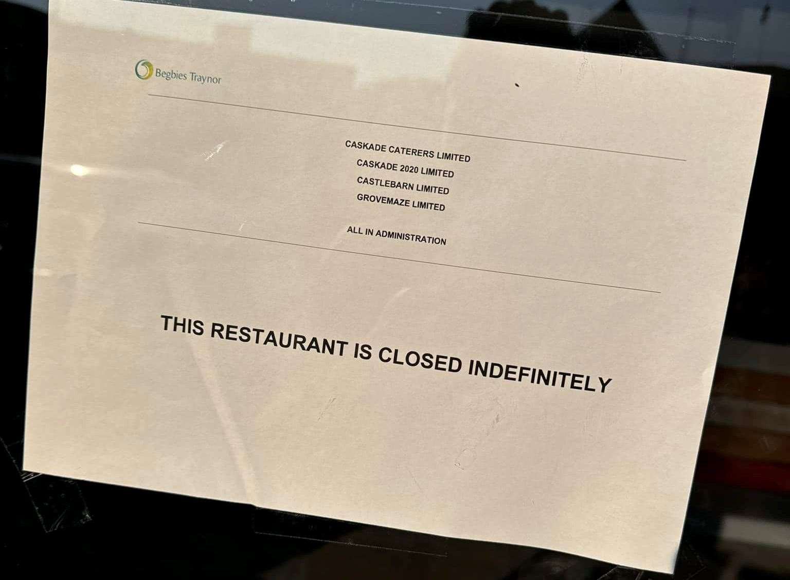 One signs reads ‘this restaurant is closed indefinitely’