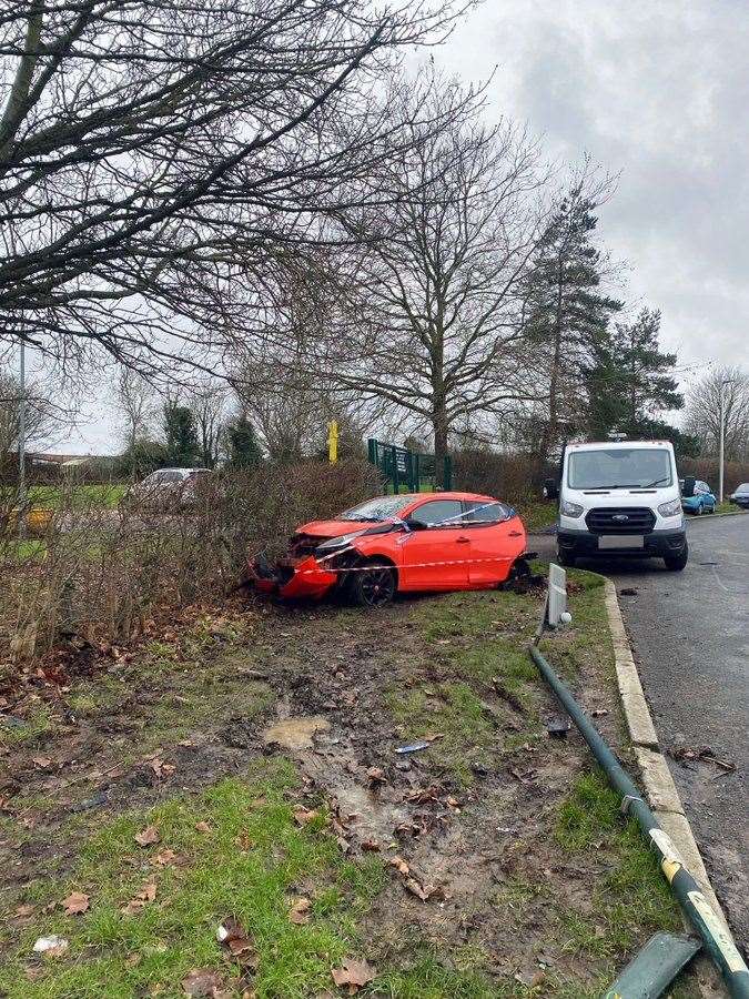 Police arrested a woman in Magpie Hall Road, Chatham, after her silver car crashed into a parked Toyota Aygo. Picture: Kent Police