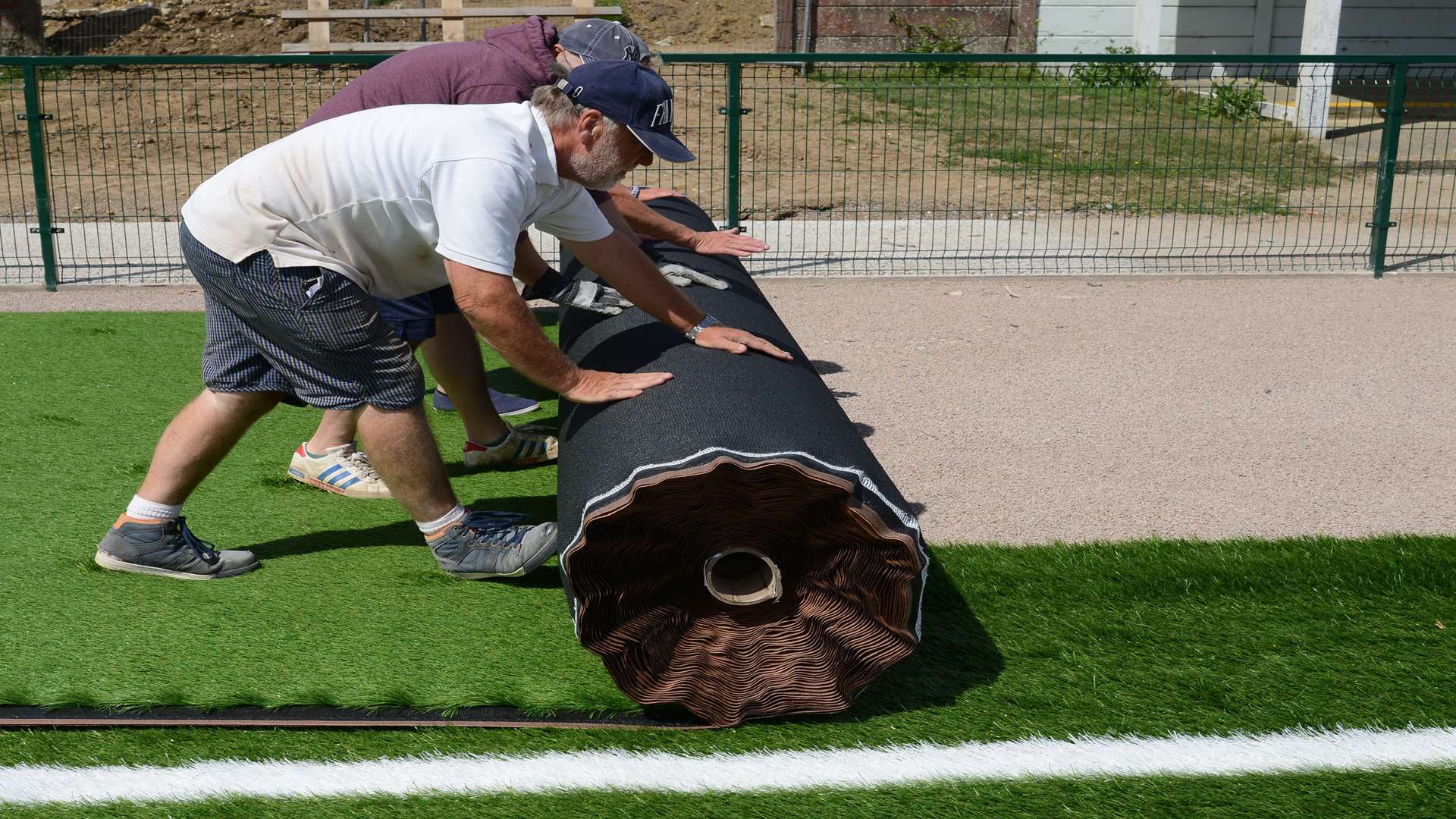 Ashford United owner Don Crosbie hard at work Pic: Gary Browne