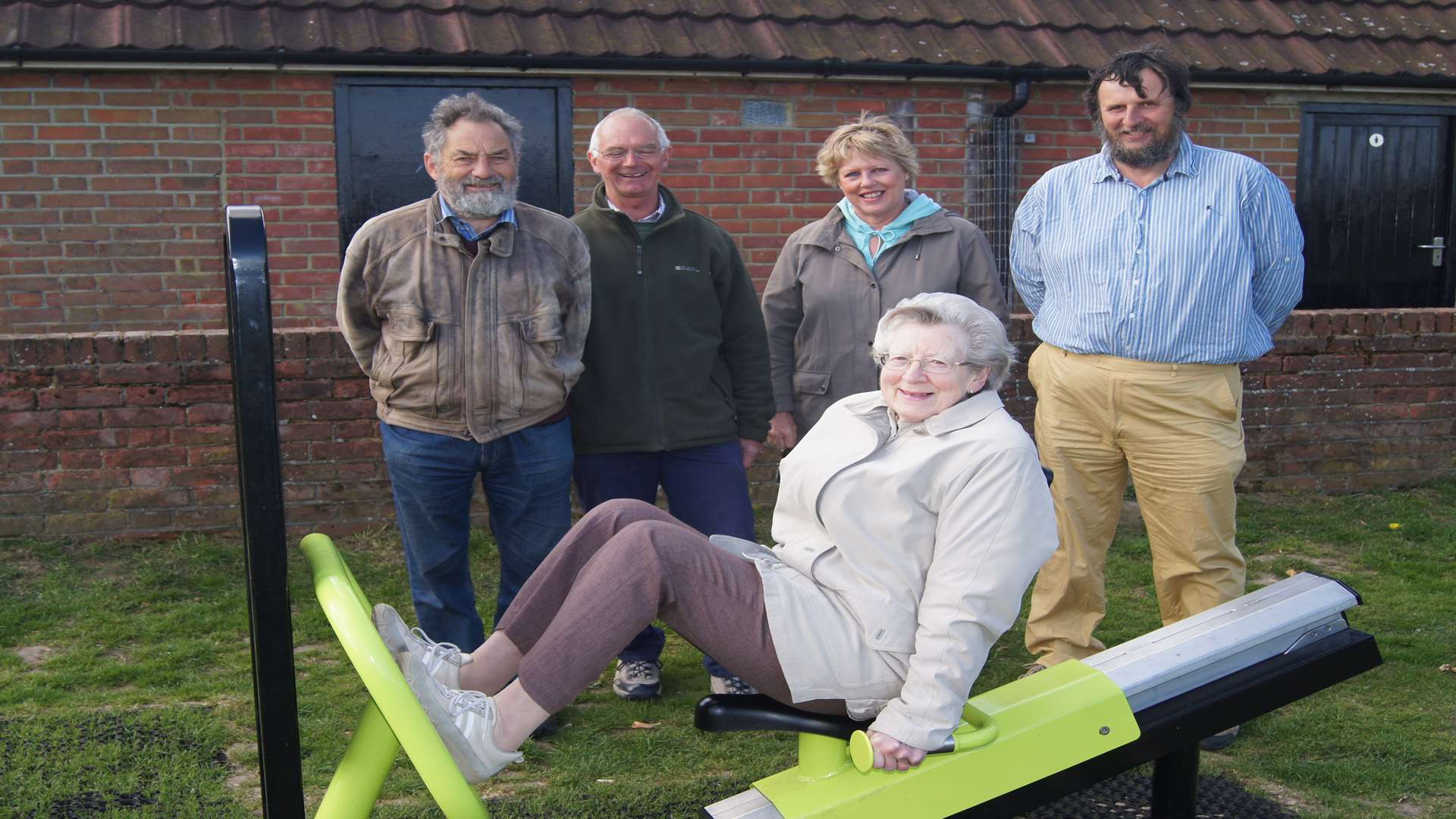 JFT trustee Nina Vallack has a go on the leg press to the general amusement of Graham Foat, Ian Chandler, Lisa Jones (Parish Clerk) and Andrew Wilkinson.