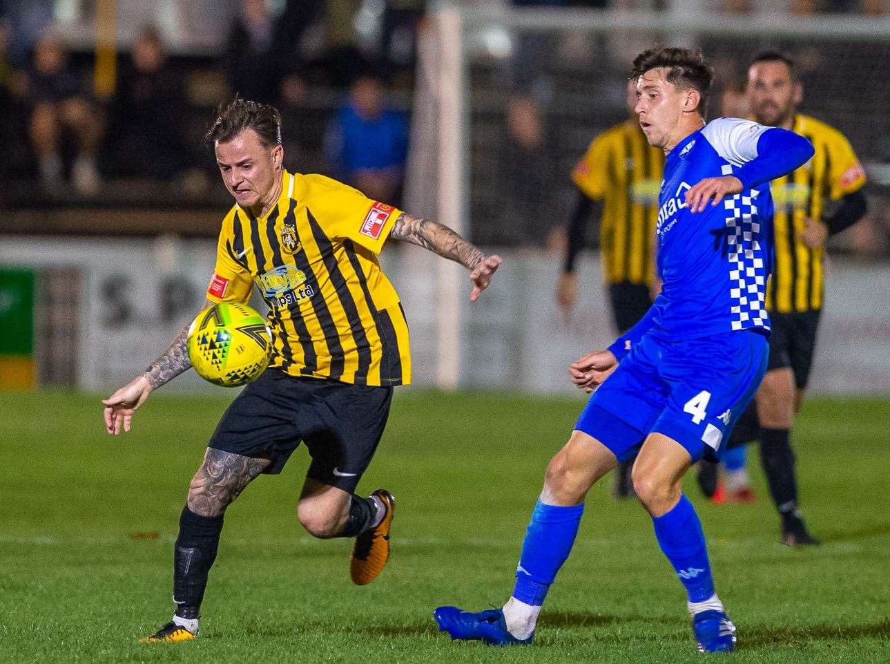 Folkestone Invicta defender Jordan Wright, left, faces a spell on the sidelines. Picture: Ian Scammell