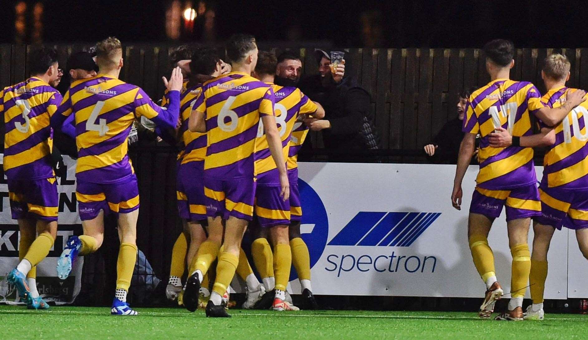 Deal celebrate with the away fans during their 4-2 victory at Faversham Town on Saturday. Picture: Ian Scammell