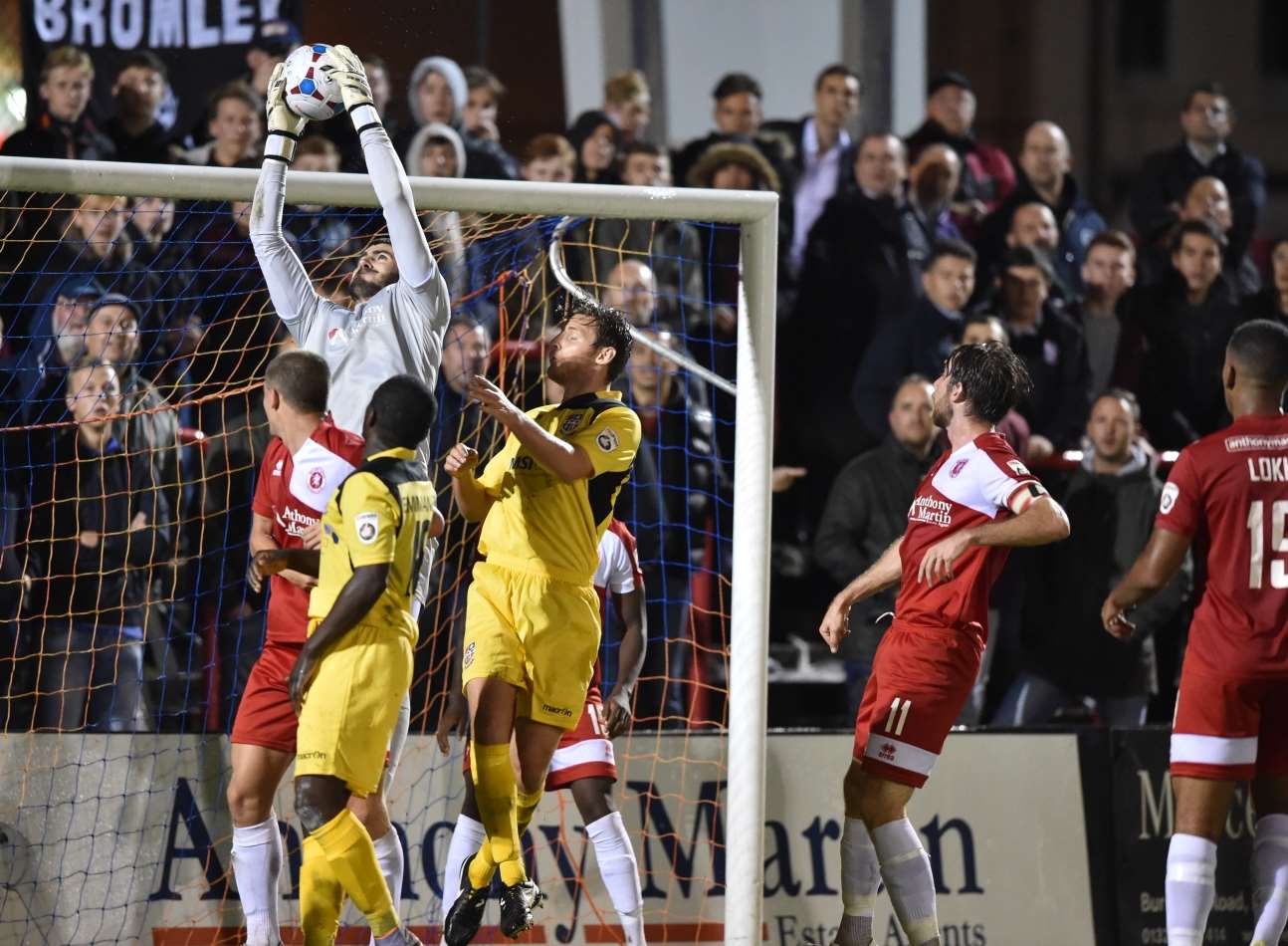 Welling keeper Tom King catches a cross against Bromley. Picture: Keith Gillard