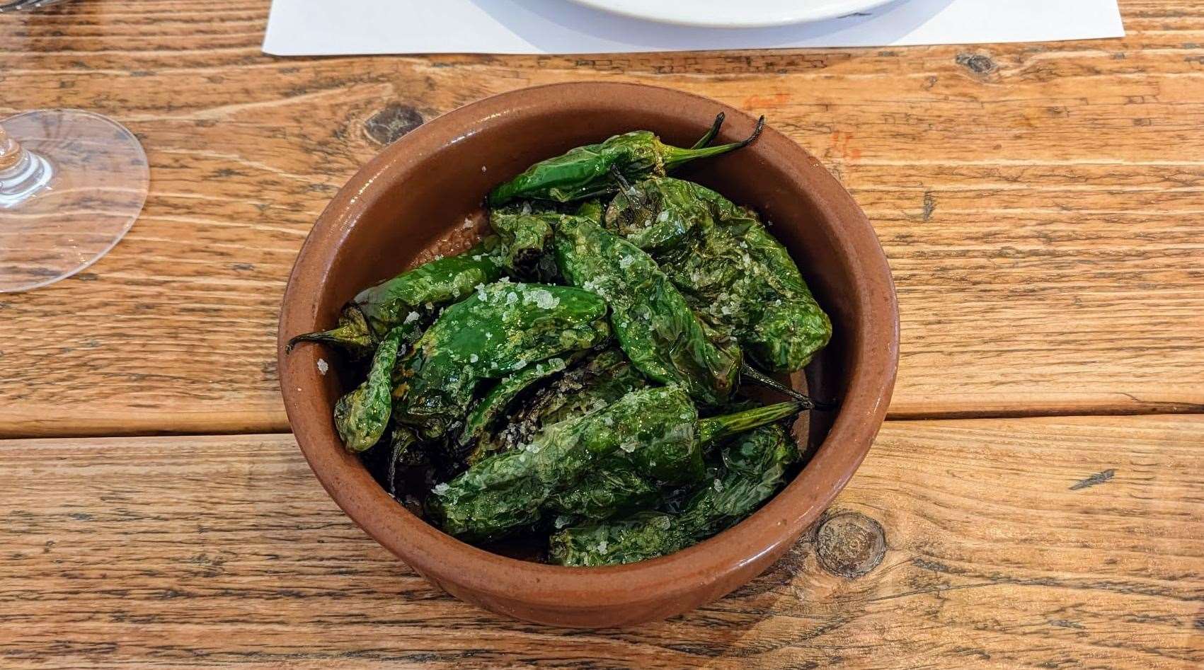 A dish of padron peppers