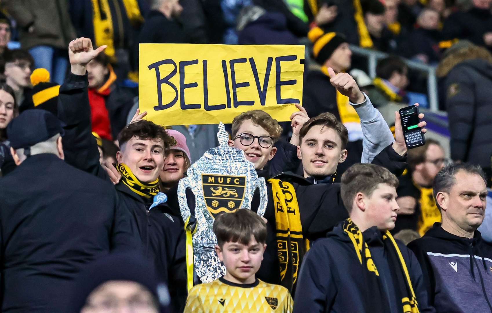 Maidstone fans get behind their team at Coventry. Picture: Helen Cooper