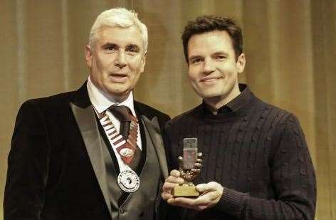 Chirs Harding of Ashford receives his award from Marvin Berglas, president of The Magic Circle. Picture: Brendan Rodrigues Photography