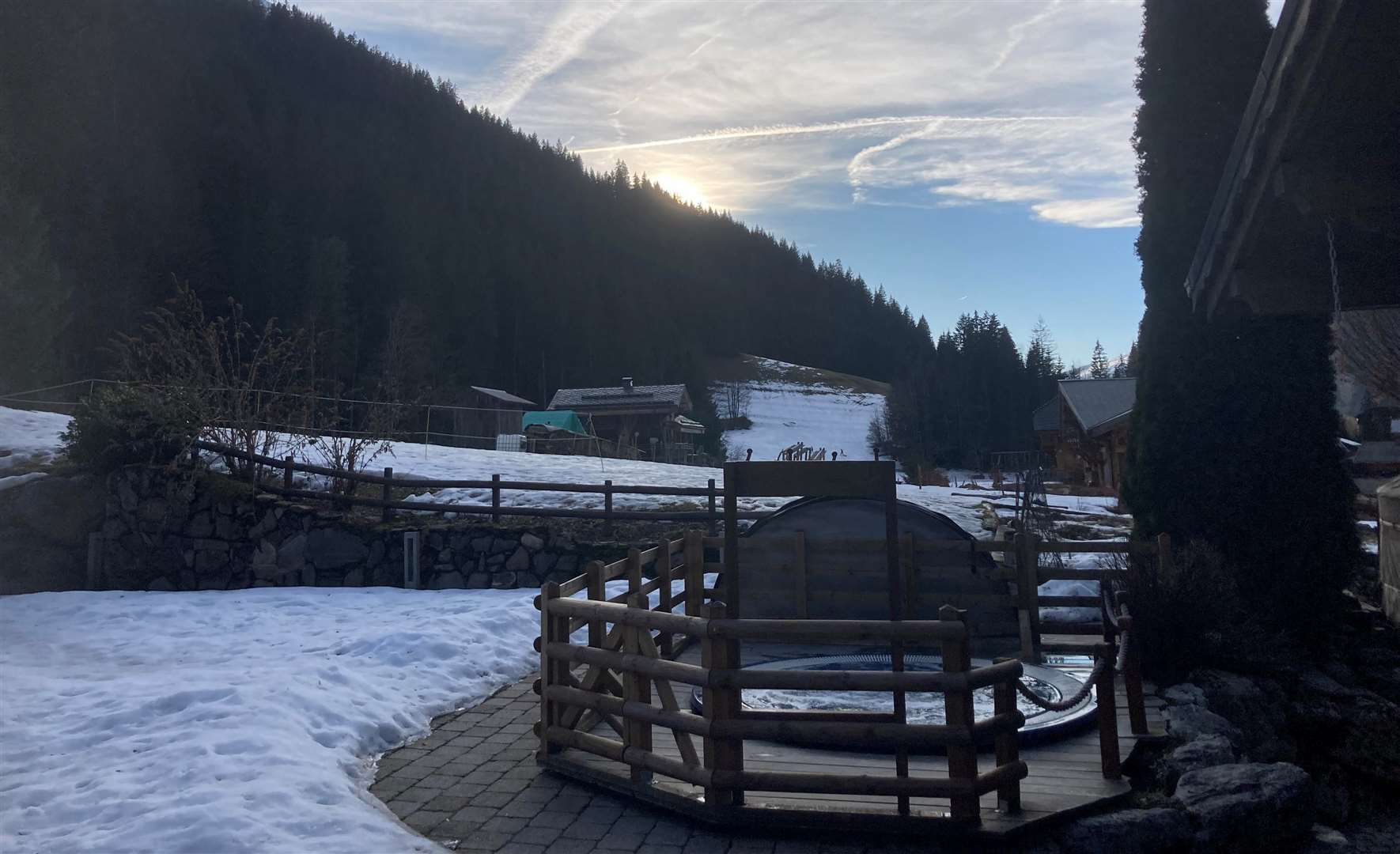 The chalet's garden hosts a hot tub and spectacular views