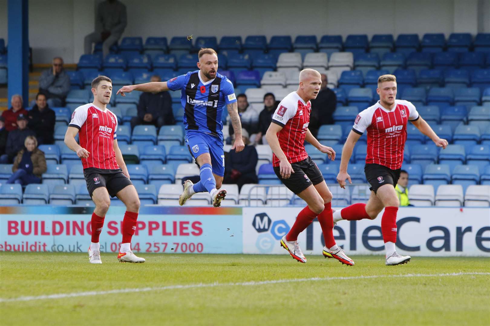 Gillingham midfielder Danny Lloyd has a shot at goal Picture: Andy Jones