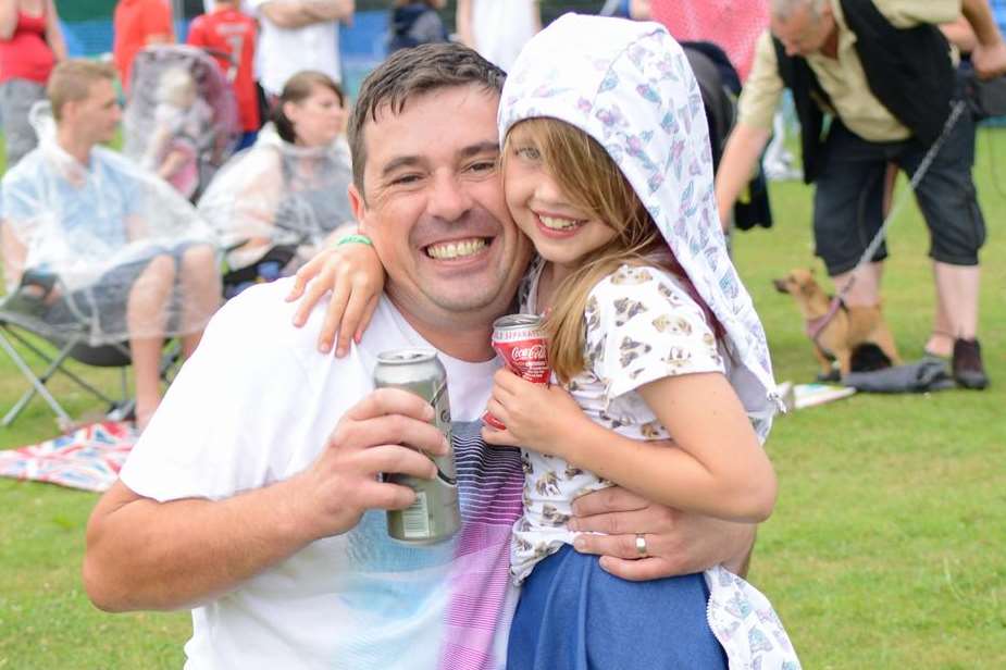 Olivia, 8, rocks out with dad Justin