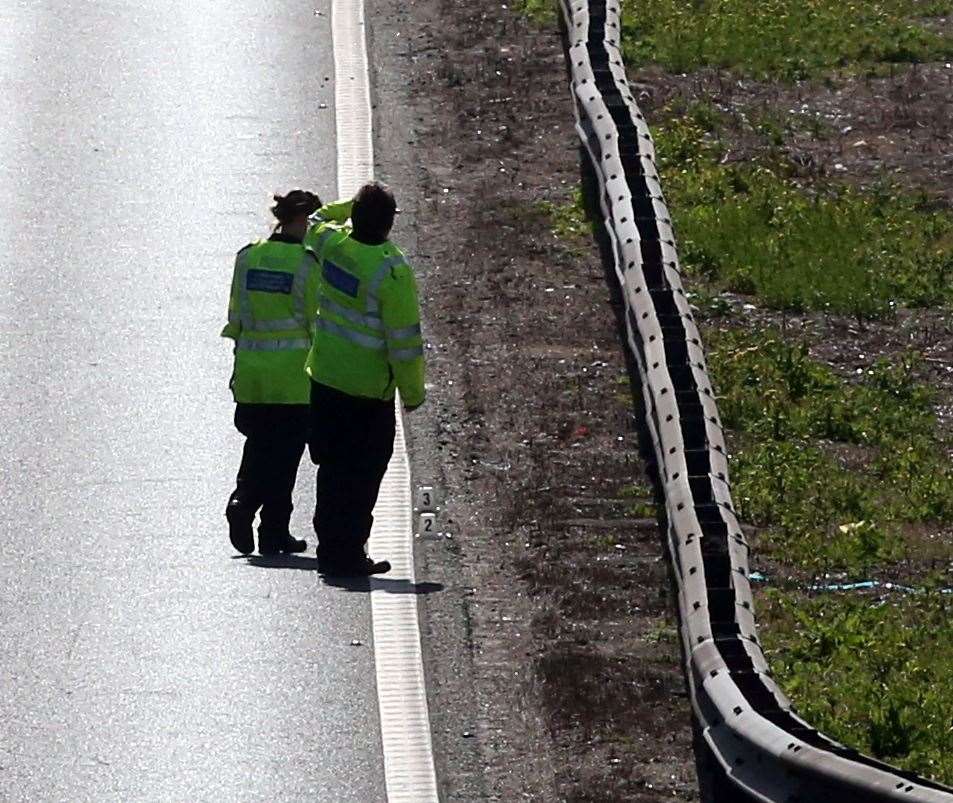 Crash investigators on the A2 near Dartford where two lorries collided. Picture: UKNIP