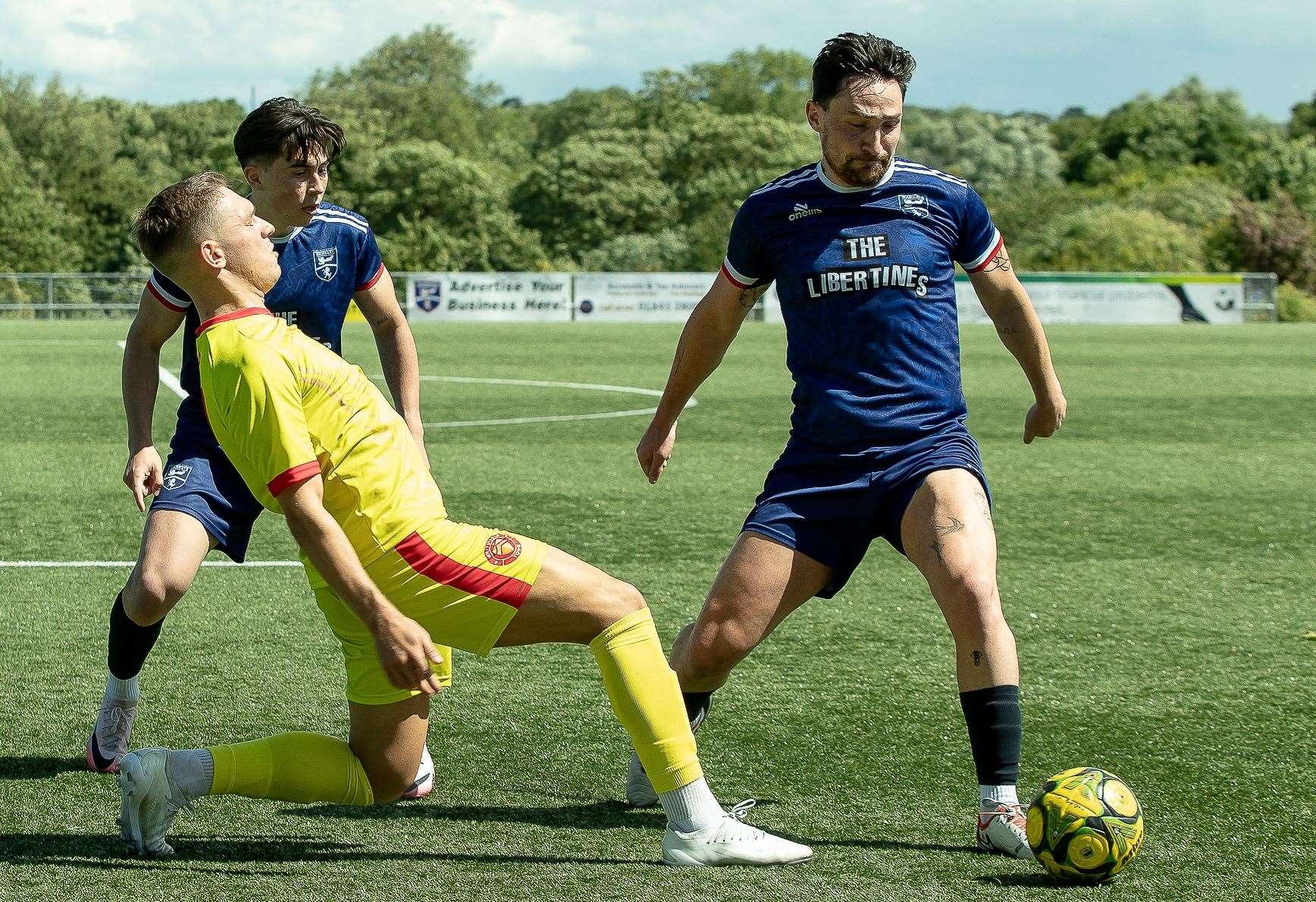 Whitstable's Josh Oliver is beaten to the ball by a Margate player on his Hartsdown Park return. Picture: Les Biggs