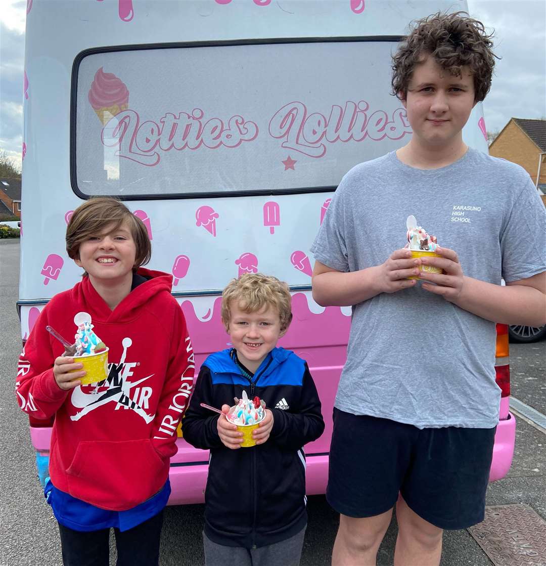 Humphrey, Pip, and Archie Hamilton-Barnes with their treats