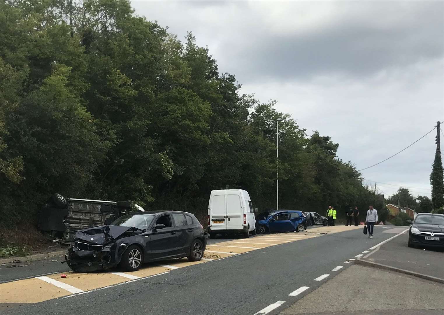 Cars were left strewn about the road after the crash in Cuxton