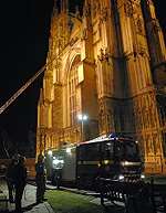 Firefighters tackle the mock blaze at Canterbury Cathedral. Picture: Chris Davey