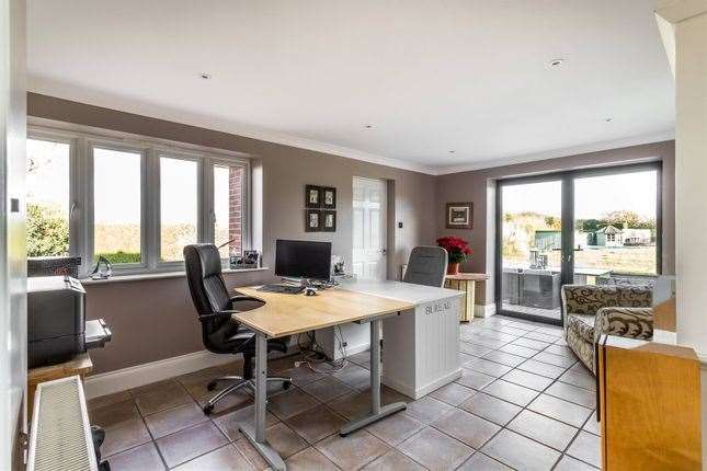 A home-working area with a view of the summerhouse and pool. Picture: Zoopla / Hamptons