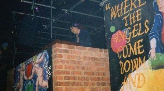 On the decks at Atomics nightclub in the 1990s. Picture: Mick Clark