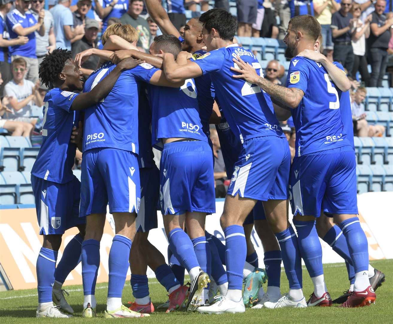 Gillingham players celebrate Scott Kashket's winning goal. Picture: Barry Goodwin