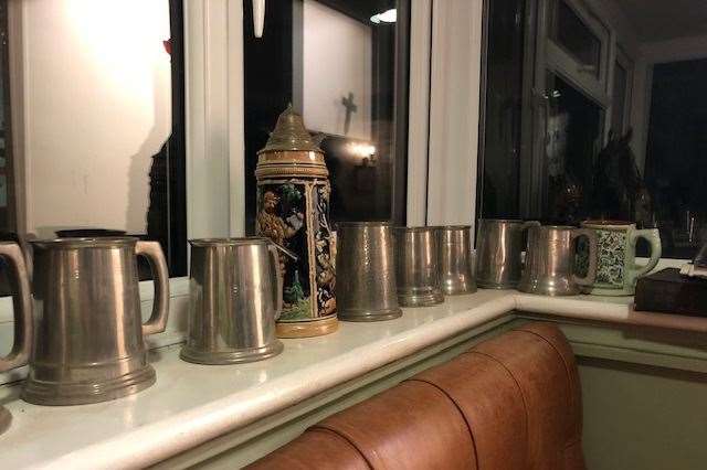 I don't think they're still being used today, but there's a good collection of pewter tankards and an occasional stein