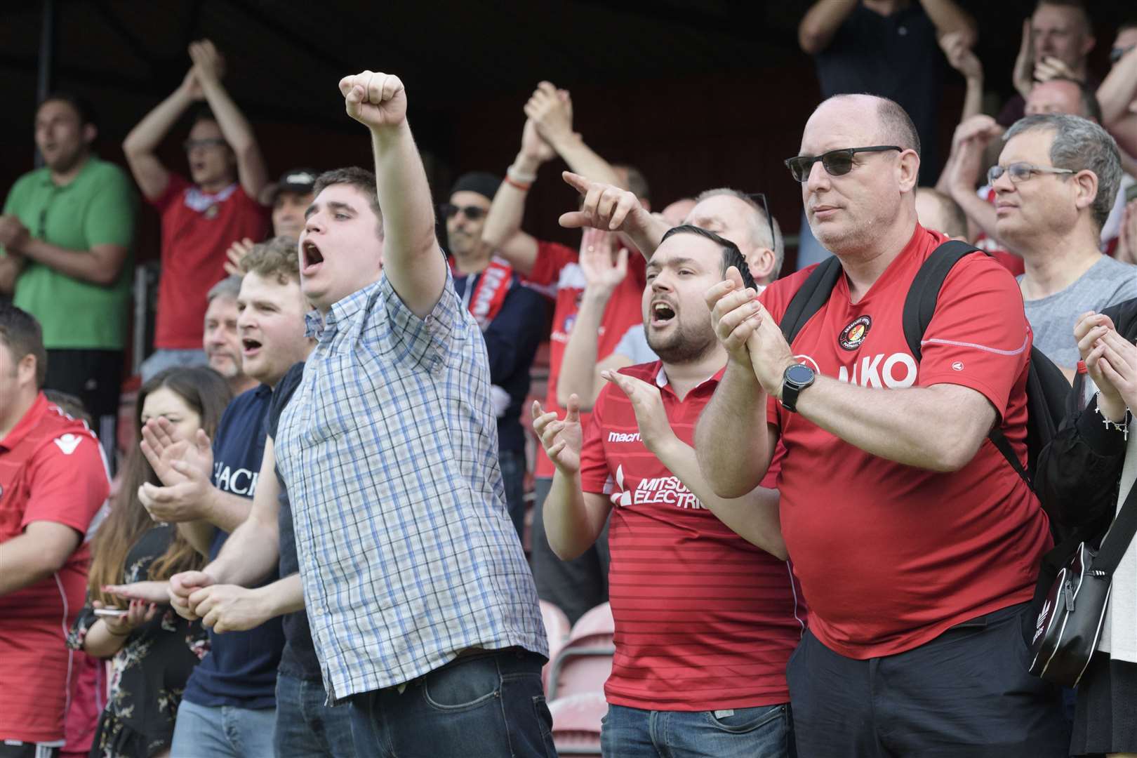 Ebbsfleet fans cheering their team on at Stonebridge Road. Picture: Andy Payton (48660355)