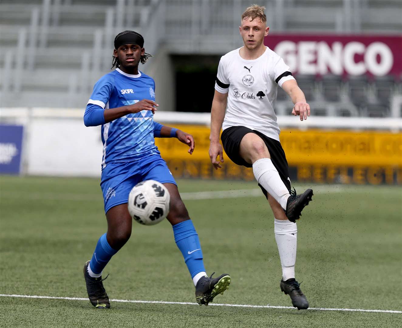 AFC Wilgar (white) play the ball forward against The Warren at Maidstone’s Gallagher Stadium. Picture: PSP Images