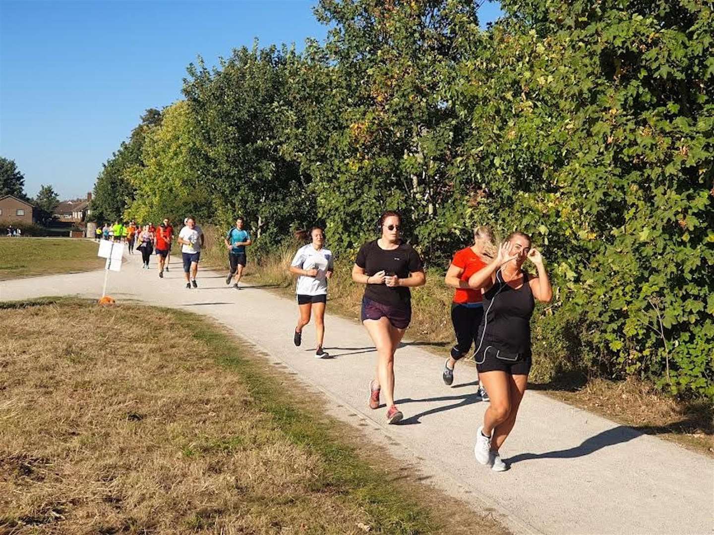 Runners on the first lap corner of Sittingbourne parkrun (19644588)