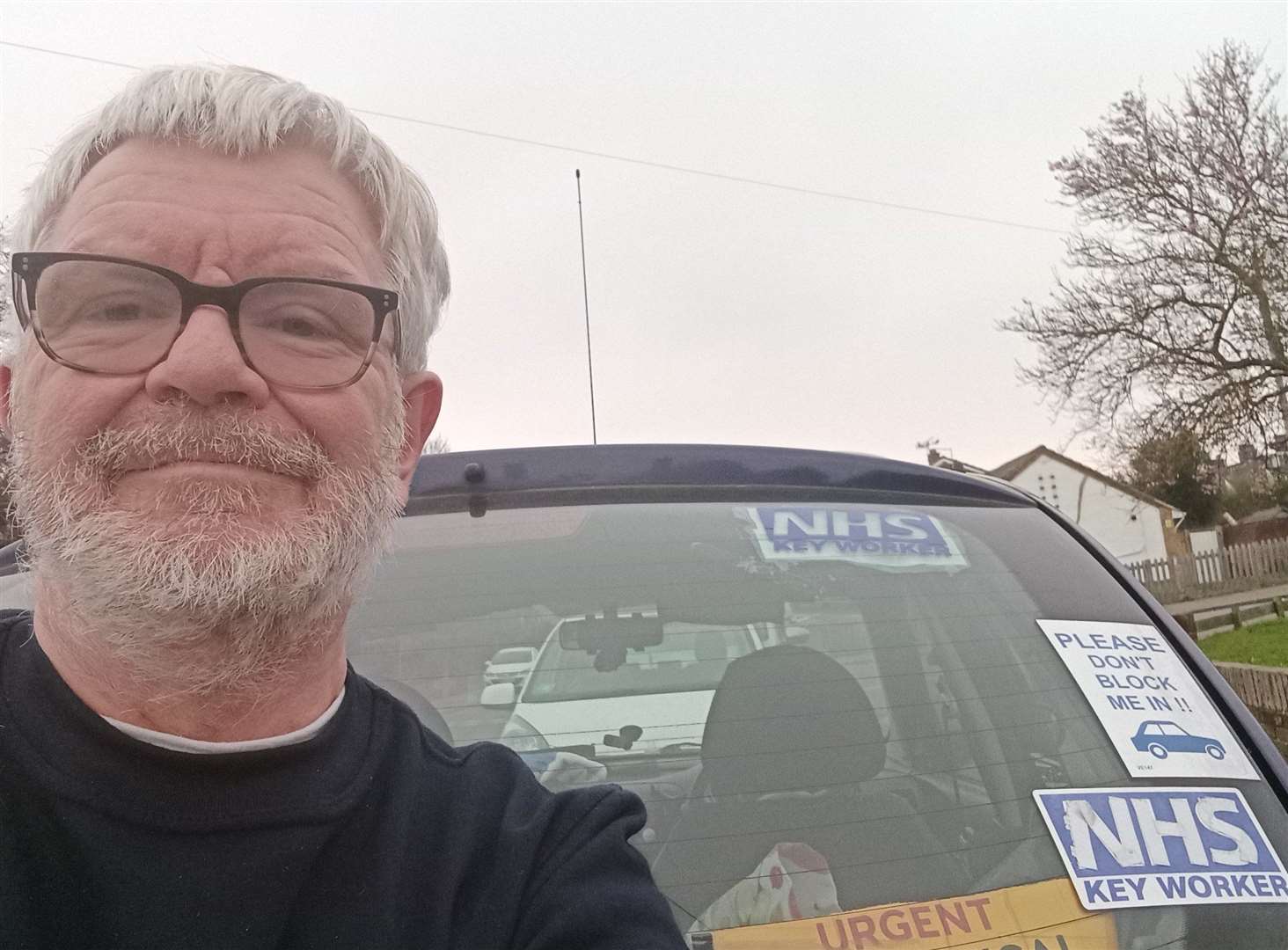 Spat at: NHS volunteer Brian Grove, 60, and his car