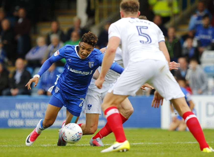 Sean Clare goes down in the box but Gills don't get a penalty Picture: Andy Jones