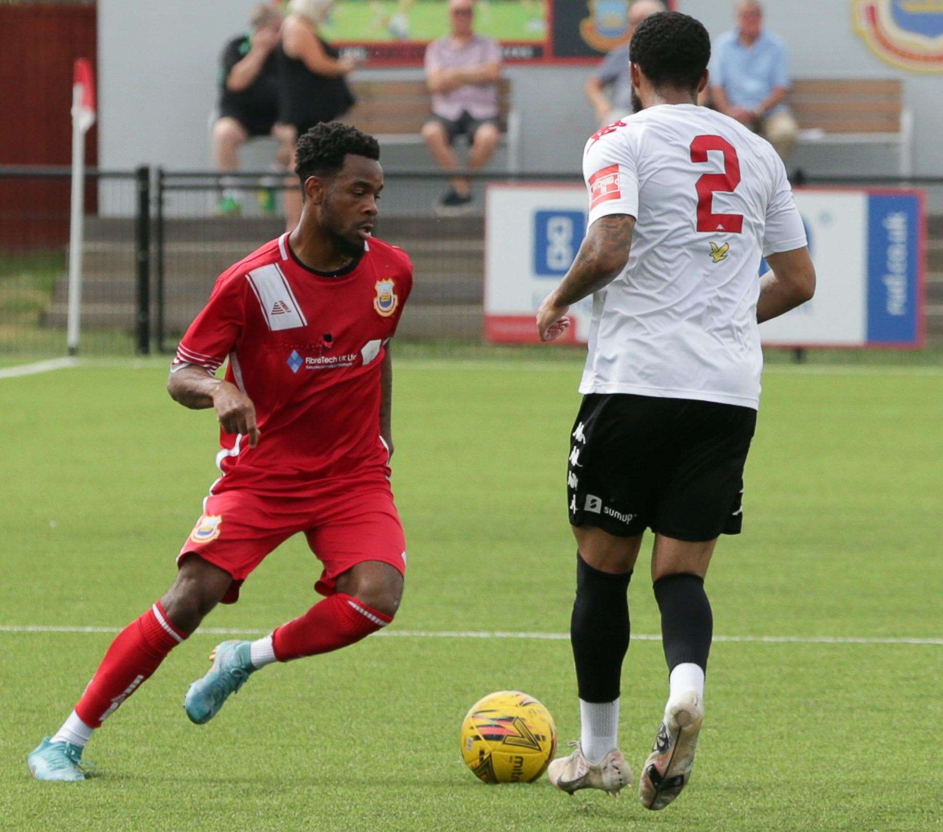 Whitstable's Josh Williams cuts inside Lewes defender Jake Elliot. Picture: Les Biggs