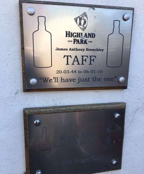 A pair of commemorative plaques mounted on the wall in the garden area presumably remember a couple of locals no longer with us – James Anthony Brenchley and Roger Ellis