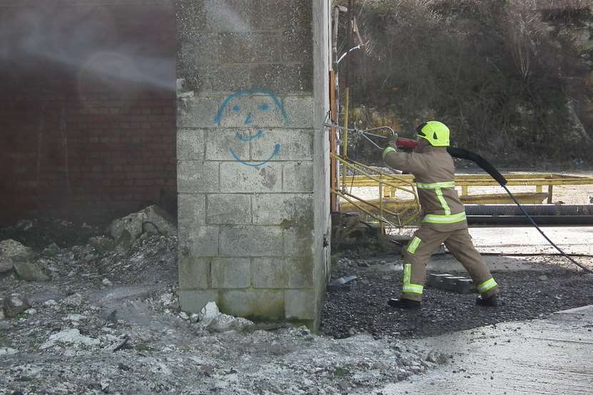 The cobra uses high pressure water and a cutting agent to drill through construction materials. Picture: KFRS.