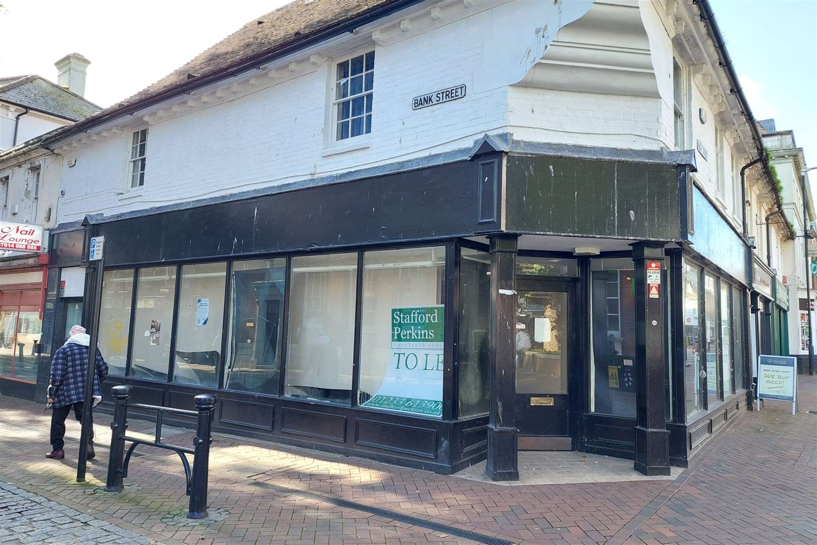 The empty unit sits on the corner of Ashford High Street and Bank Street