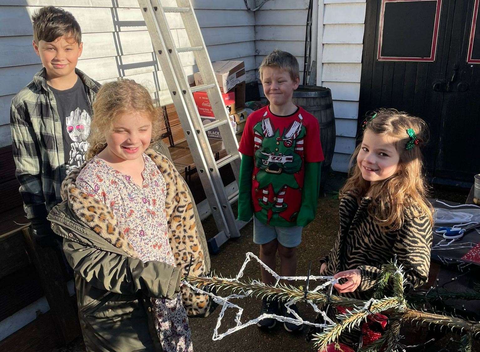 Children have helped decorate the giant spruce - but there's still room for more