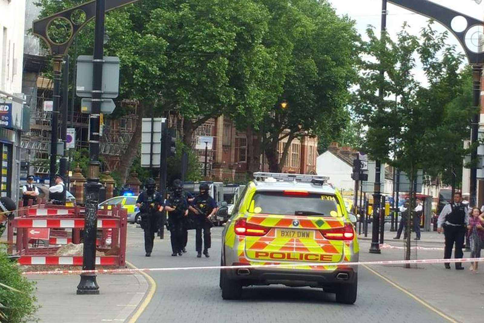 Police activity on Barking Road in East Ham, east London. Picture: @JrKamrulJr/PA Wire