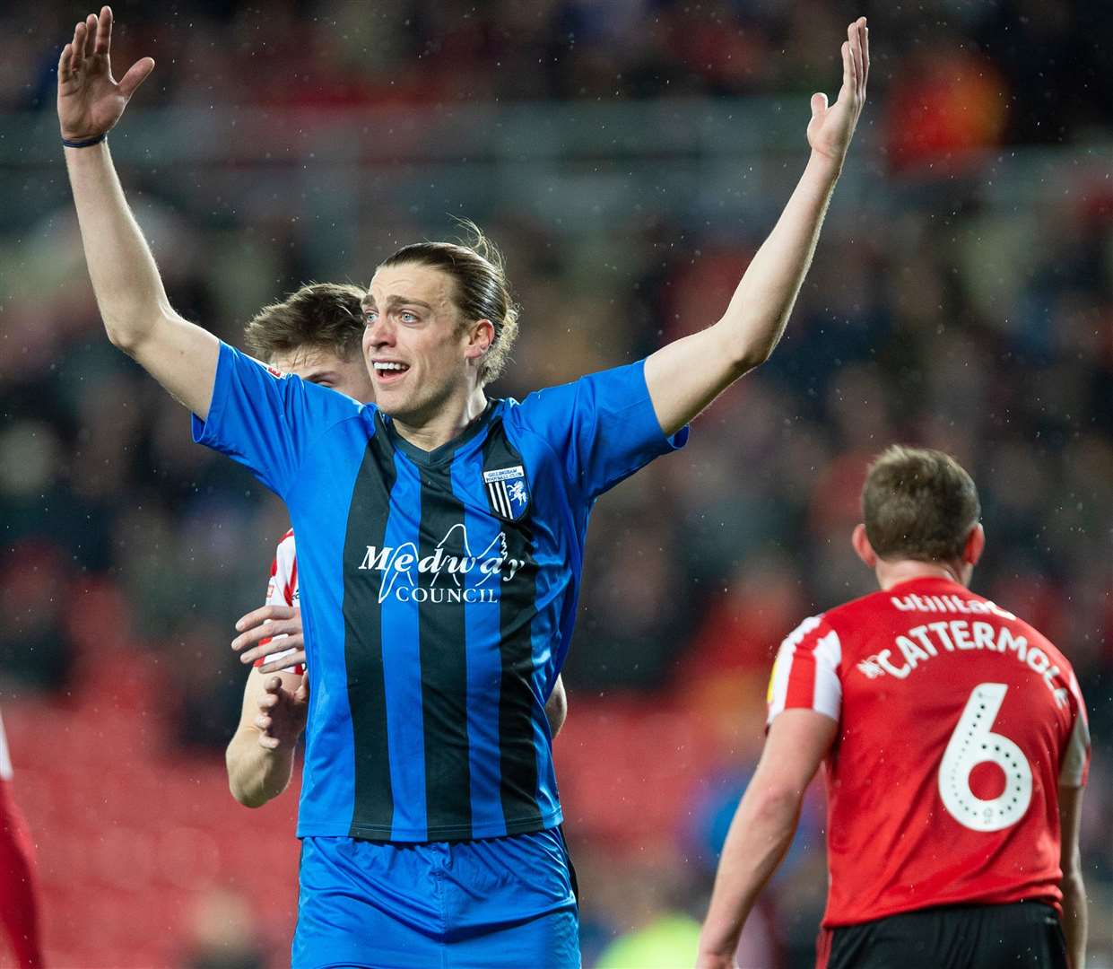 Tom Eaves complains to the referee’s assistant about his treatment at set-pieces Picture: Ady Kerry