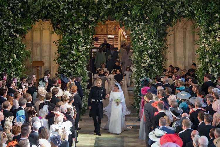 Prince Harry and Meghan, leaving St George’s Chapel at Windsor Castle after their wedding (Dominic Lipinski/PA)