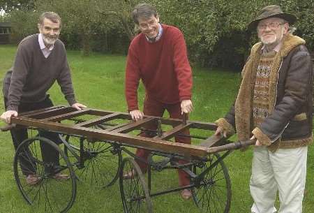 LOST AND FOUND: Joe Day, right, Ray Saich, left, and Simon King with the treasured bier. Picture: JOHN WARDLEY