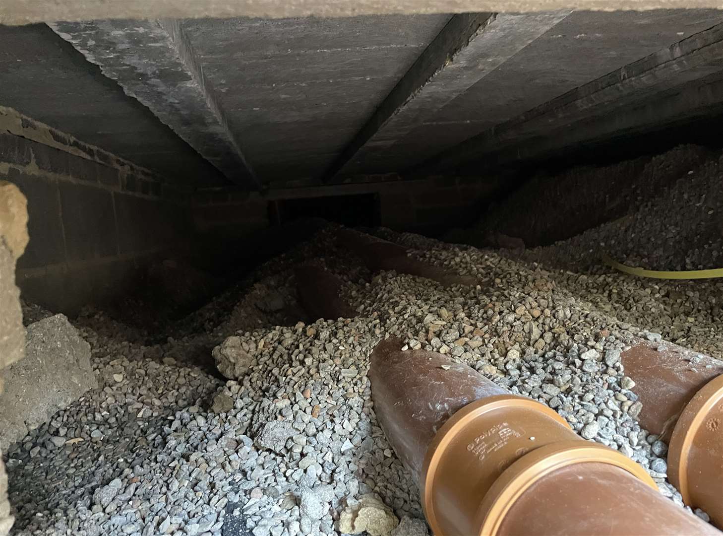 Builders tunnelled under the house from the back garden to the front door to fix drainage issues