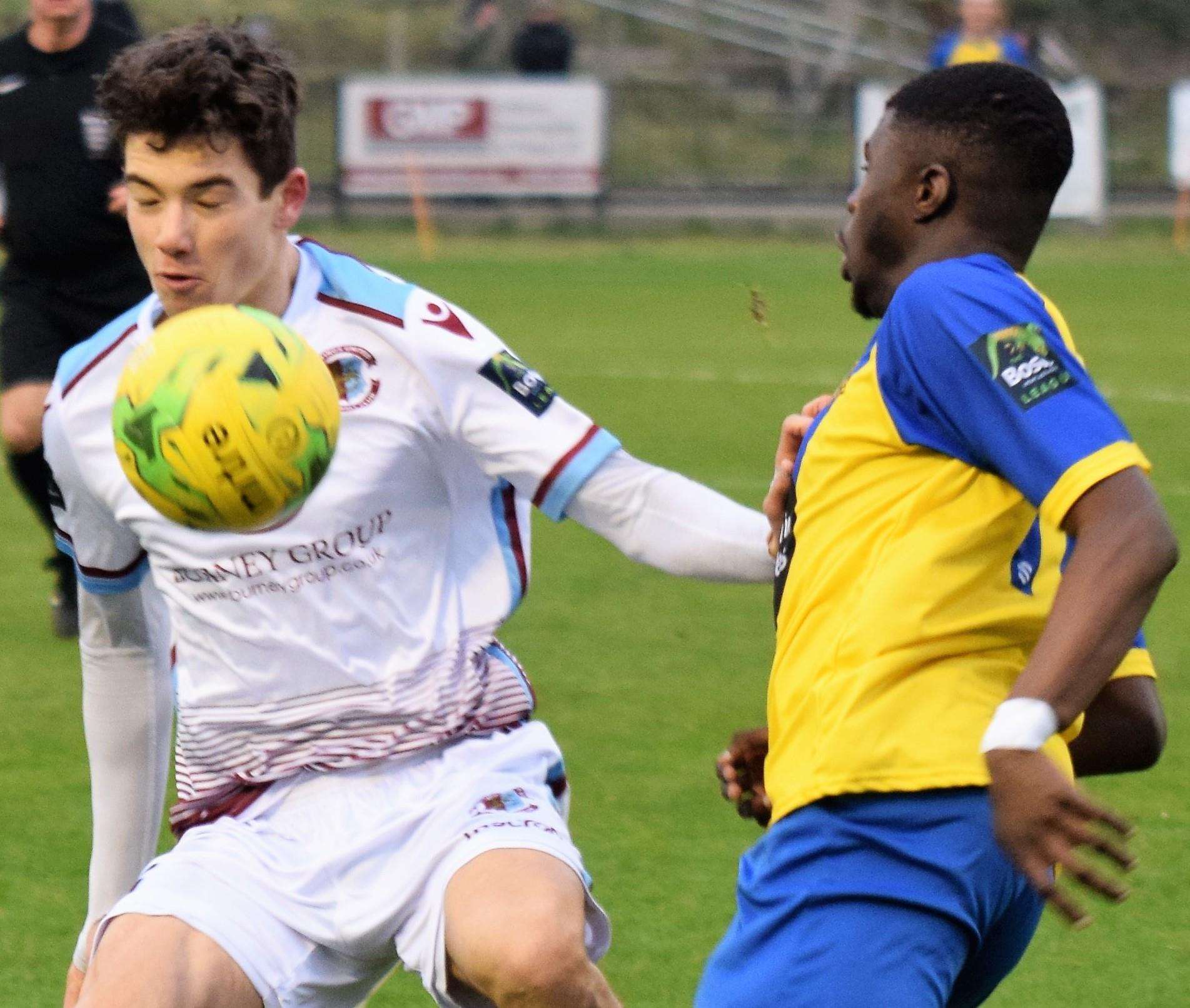 Action from Sittingbourne's last league game - a 5-0 defeat at Hastings. Picture: Ken Medwyn