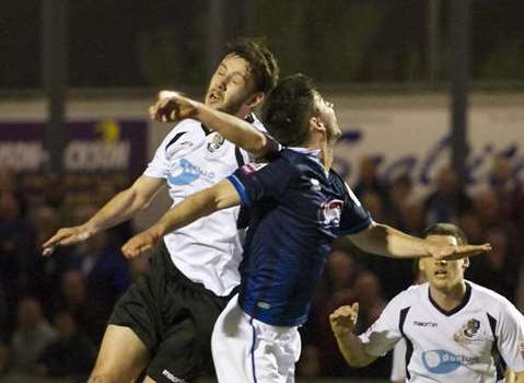 Rory McAuley climbs high against Grimsby Picture: Andy Payton