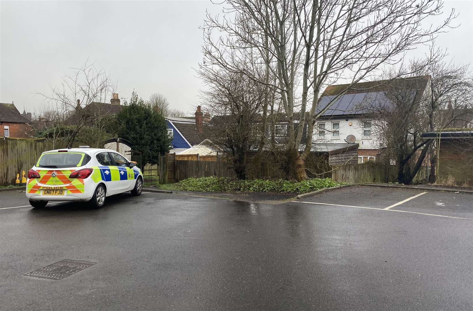 One police car at the scene this afternoon. It is parked behind the small row of shops which includes Spicy Touch