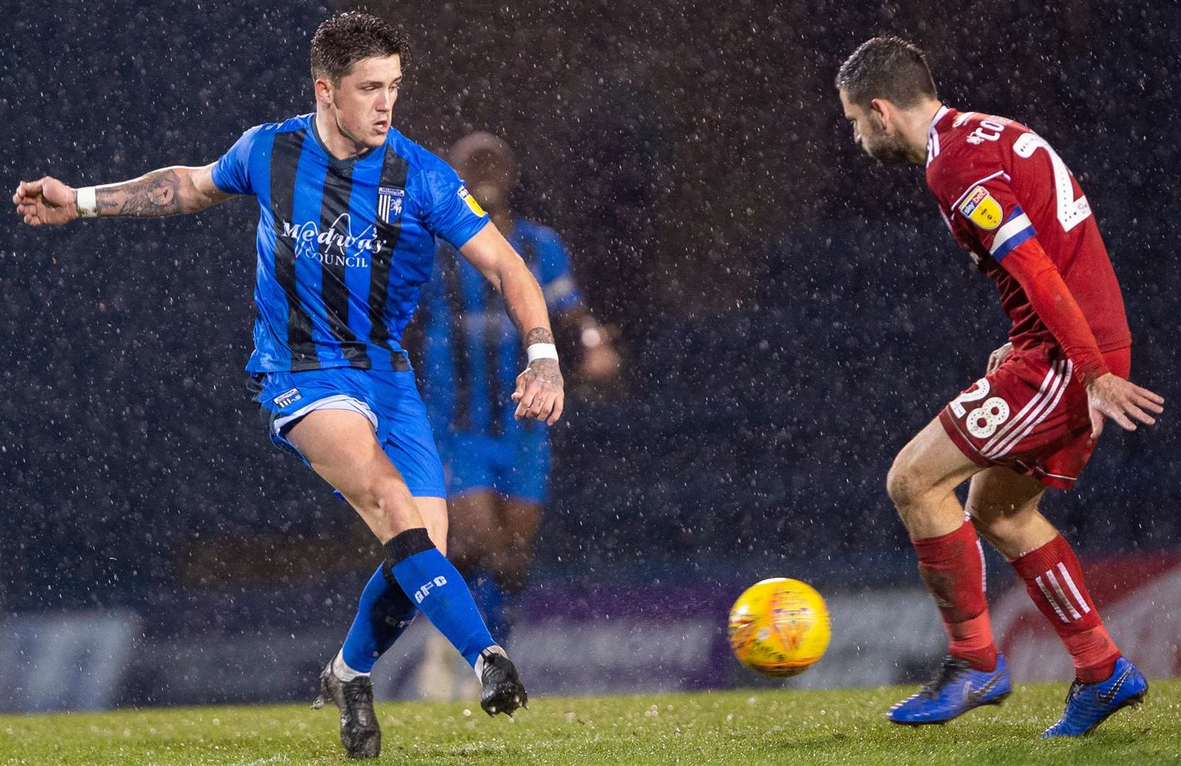 Darren Oldaker slides a forward pass beyond Seamus Conneely Picture: Ady Kerry