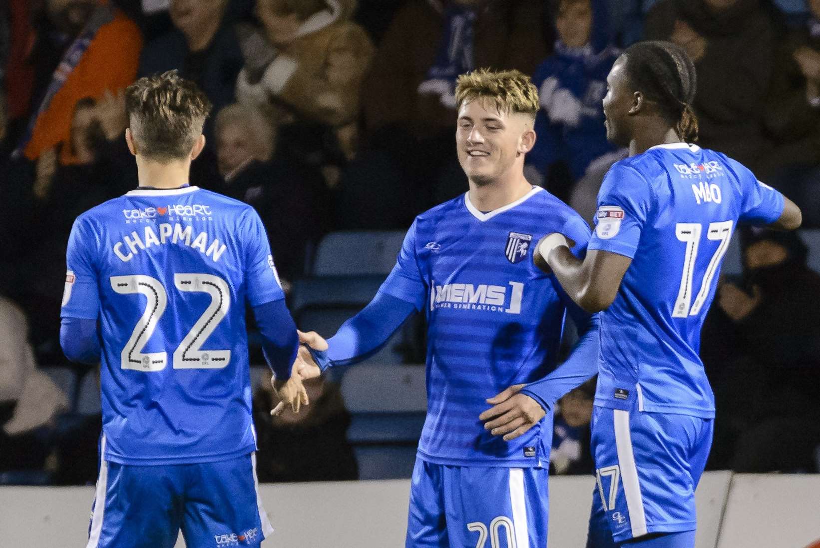 Darren Oldaker receives the congratulations after scoring from a free-kick Picture: Andy Payton