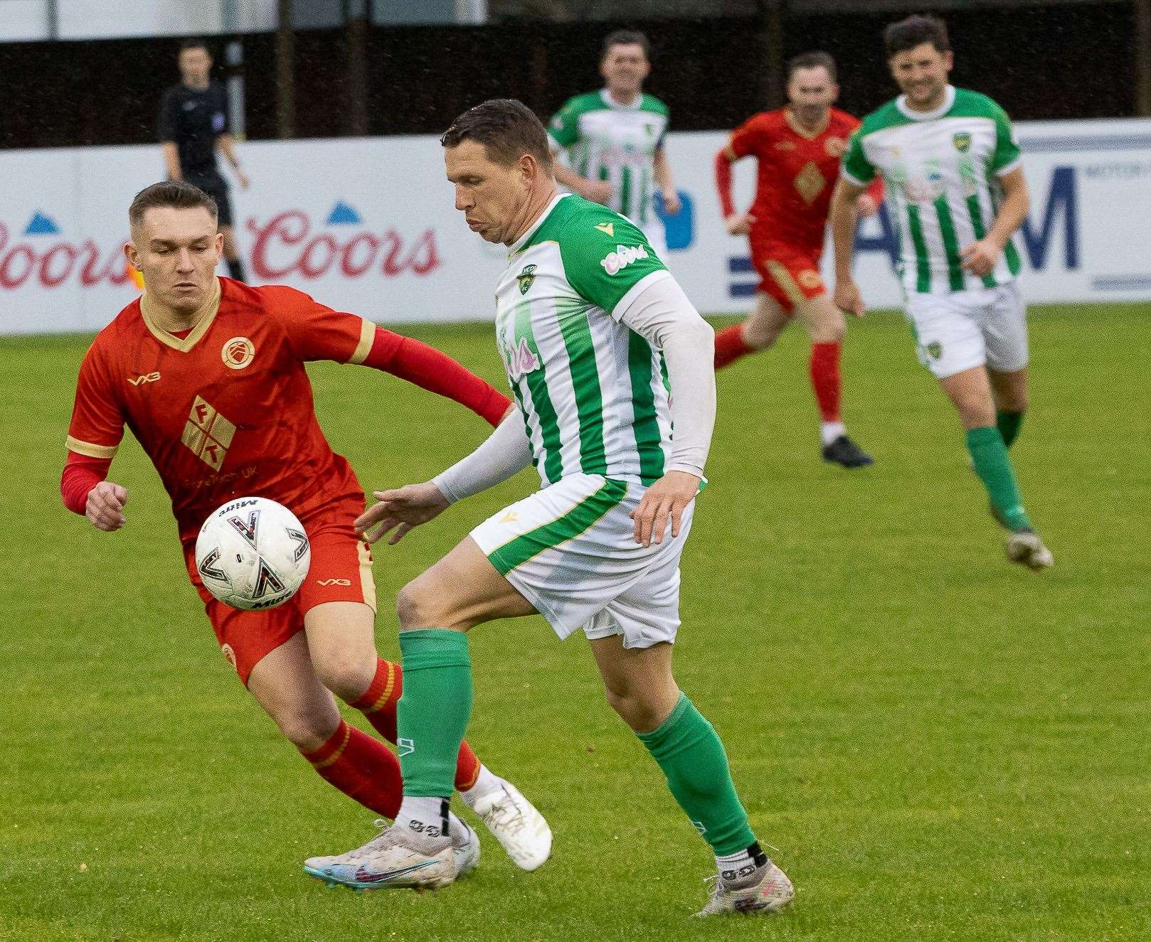 Whitstable’s Josh Oliver (red) is up against VCD’s Charlie Heatley on Saturday. Picture: Les Biggs