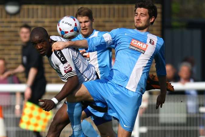 Dover's Nathan Elder battles for the ball against Whitehawk Picture: Matt Bristow