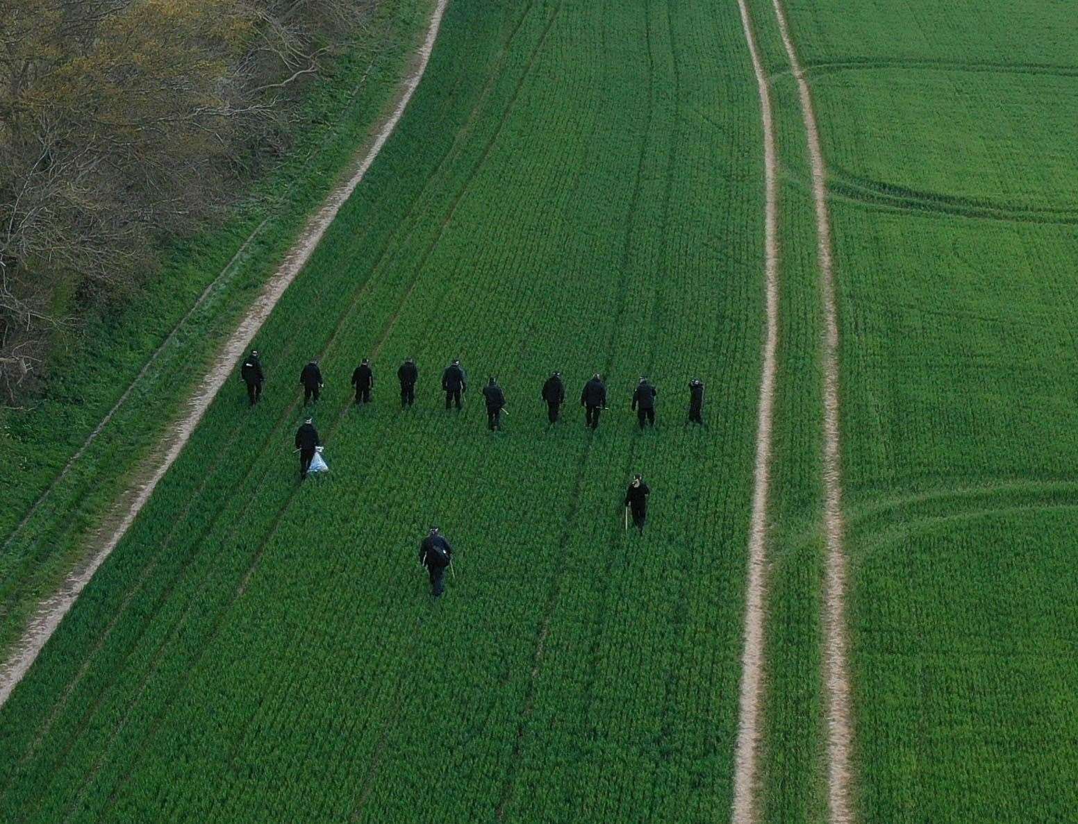 Officers searching for clues. Pictures: UKNIP