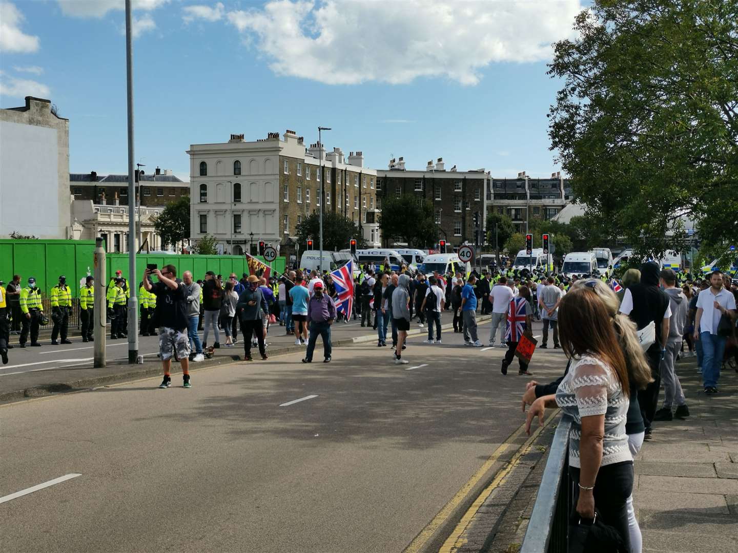 People look on at the protests. Picture: Oliver Kemp