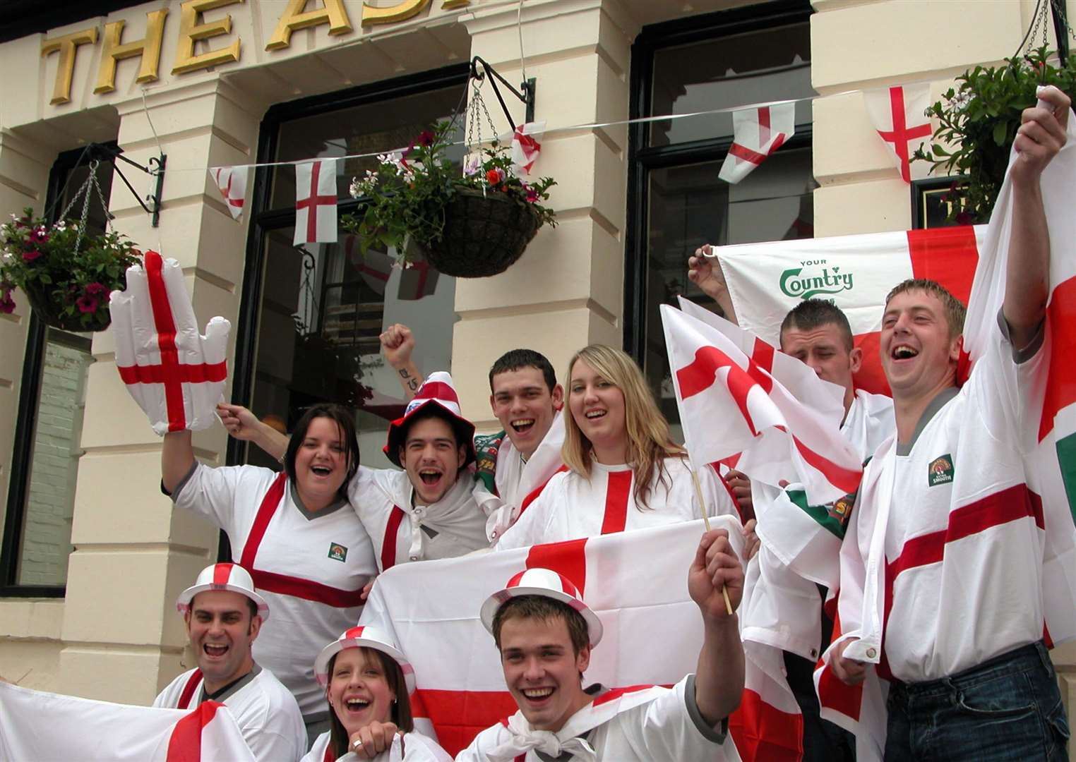 Staff and drinkers at The Ashes, Maidstone, succumb to World Cup fever - in the days long before social distancing