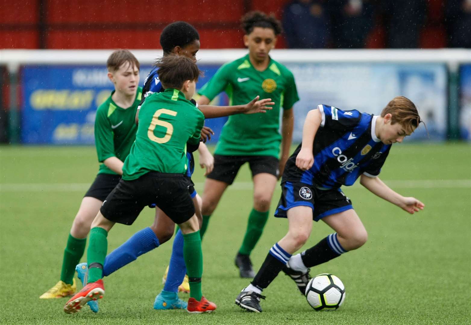 Long Lane under-13s on the ball against Sevenoaks Town under-13s. Picture: PSP Images