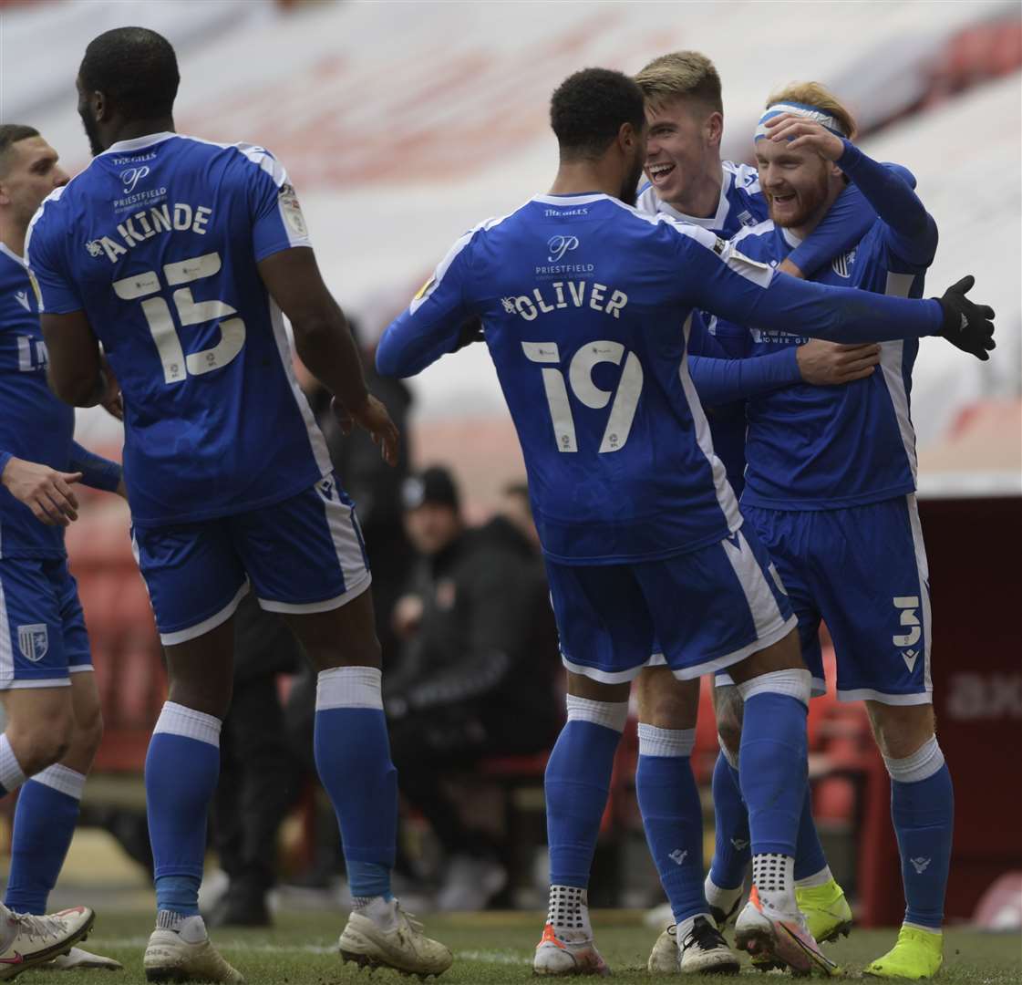 Connor Ogilvie celebrates Gillingham's second goal. Picture: Barry Goodwin. (44403549)