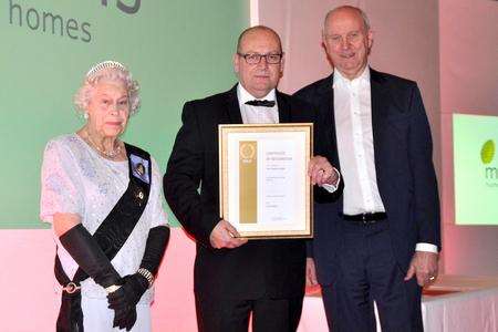 mhs homes chief executive Ashley Hook, right, with staff board member Mick Luther and Jeanette Vane a lookalike of the Queen